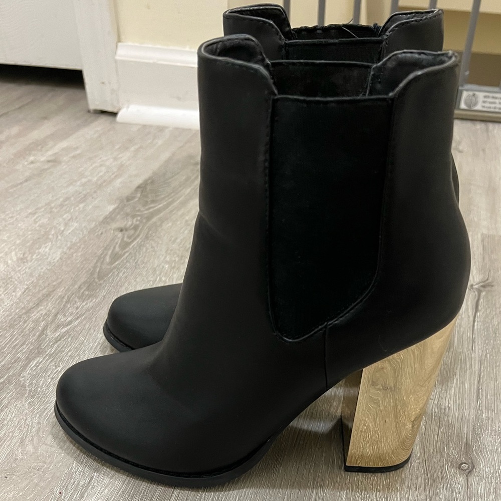Black ankle boot w/ gold heel